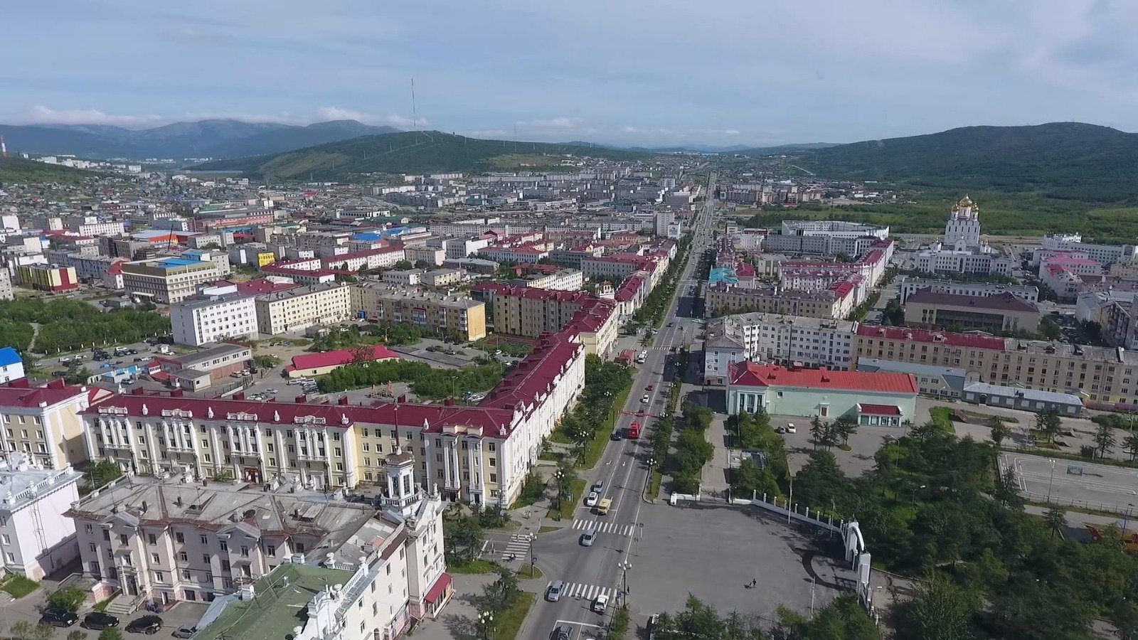 город