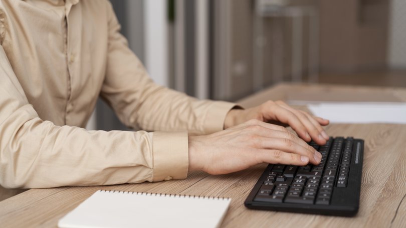 close-up-hands-typing-keyboard